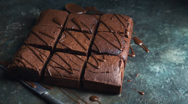 istock Brownie cake dessert. Dark sponge cake with cocoa and chocolate. 1165587404
