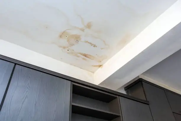 Photo of Roof leakage, water dameged ceiling roof and stain on ceiling