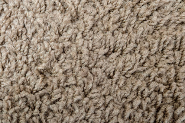 istock Texture of wool carpet close-up 1165593439