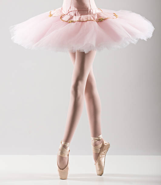 Ballerina in a pink tutu Portrait of  young ballerina ballet dancer feet stock pictures, royalty-free photos & images