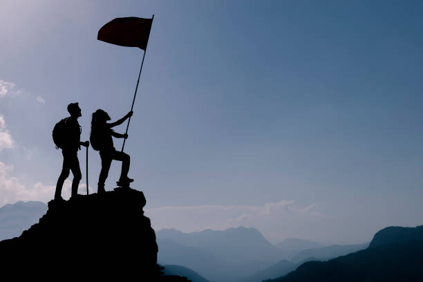 istock together winning team leaders and successful summit challenge 1165594441