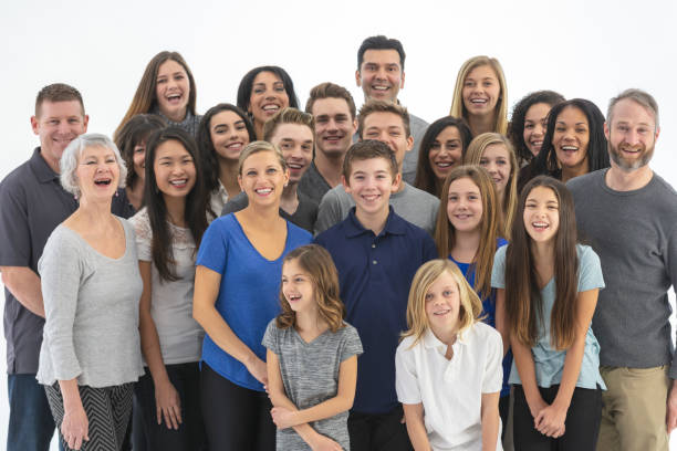 istock Large, diverse group of people gathered indoors 1165596550