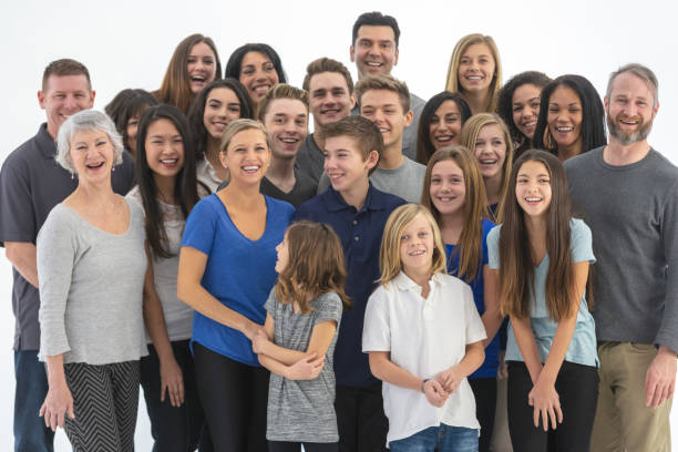 istock Large, diverse group of people gathered indoors 1165596555