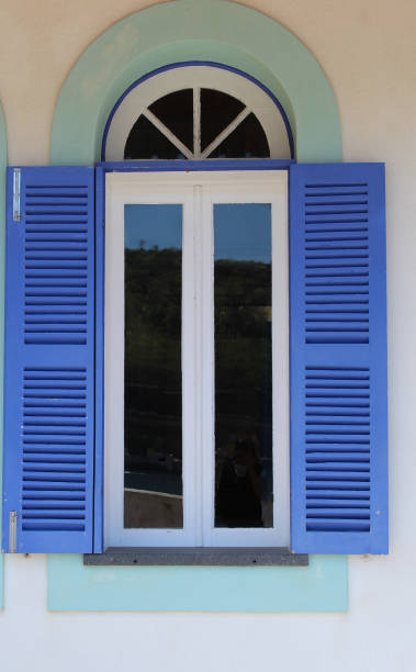 istock A European style window with shutters 1165598877