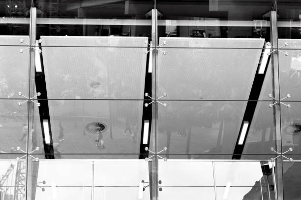 istock Black and white office building window with reflection, background with copy space 1165598911