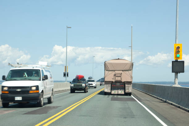 July 26, 2019: Prince Edward Island: Traffic coming and going across the Confederation Bridge joining New Brunswick and Prince Edward Island