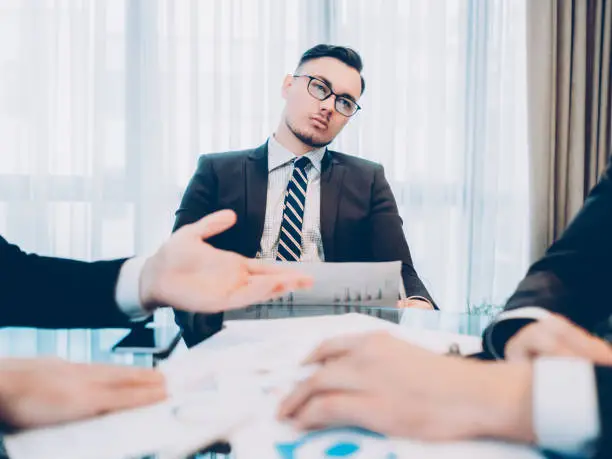 Photo of daydreaming job unmotivated male employee meeting