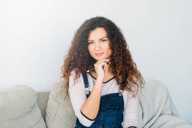 istock inspired brunette lady curly hair graphite pencil 1165610856