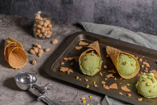 istock Pistachio ice cream in waffle cones 1165620906