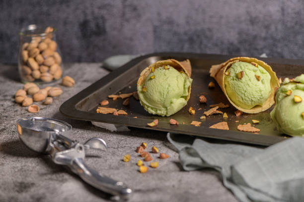 istock Pistachio ice cream in waffle cones 1165620974