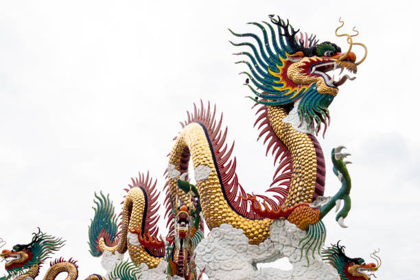 istock Chinese golden dragon statue isolated on white background. 1165621573