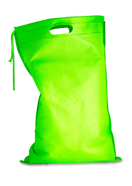 istock The green cloth bag isolated on white background 1165625372