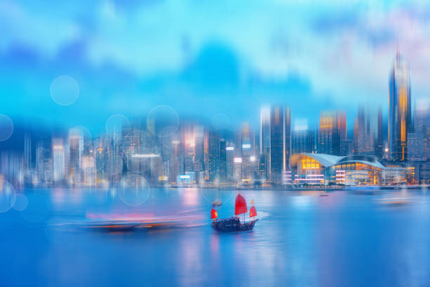 istock Abstract bokeh light with Hong Kong City night view background 1165625524