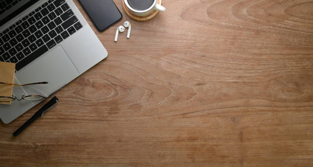 istock Top view of rustic workplace style with laptop 1165627422
