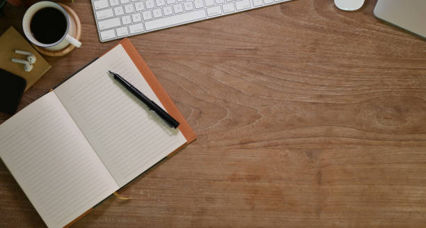 istock Top view of comfortable workplace with office supplies 1165627423