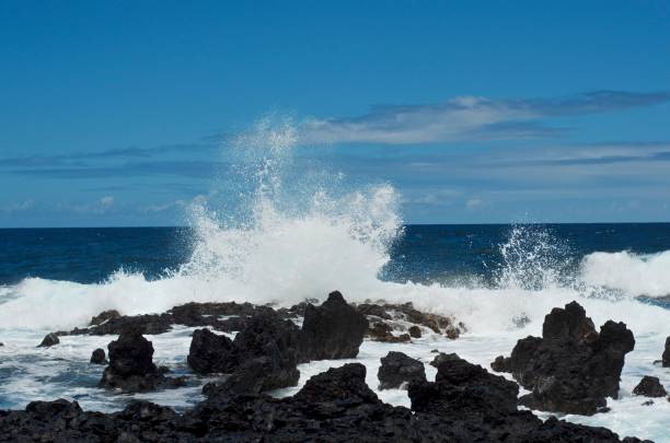 istock Waves Crashing on Lava Rock (Maui, Hawaii) 1165636811
