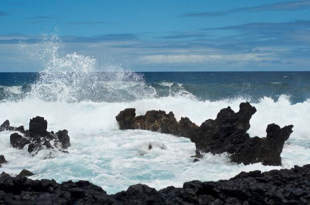 istock Waves Crashing on Lava Rock (Maui, Hawaii) 1165636818