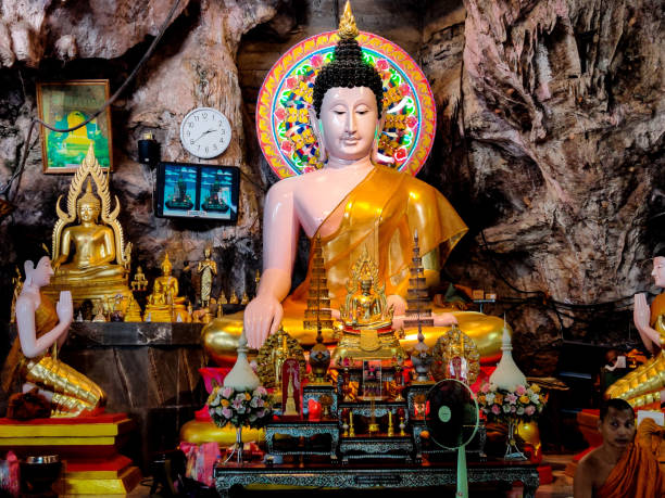 Lord buddha at tiger cave temple krabi thailand Lord buddha at tiger cave temple krabi thailand wat tham sua stock pictures, royalty-free photos & images