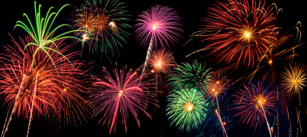 istock Beautiful fireworks display lights up the night time sky 1165642172
