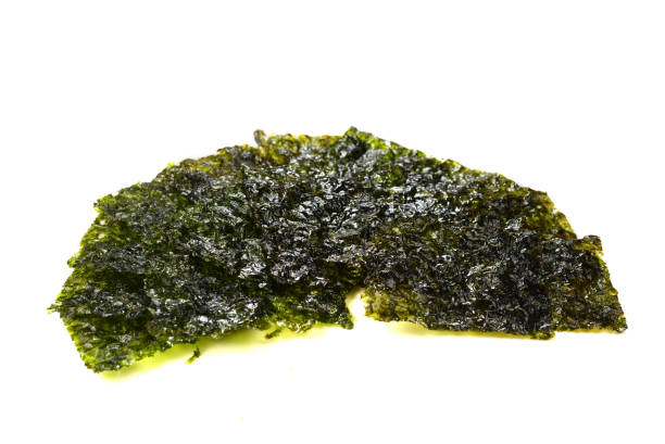 istock Nori seaweed isolated on white. 1165644939