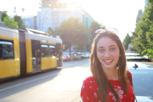 istock Young happy woman walking 1165645545