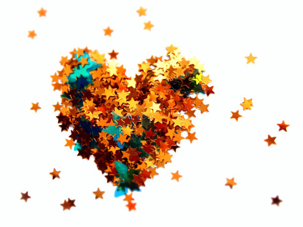 istock Golden stars glitter heart on white background 1165646189