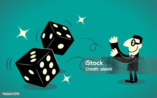 istock Businessman throwing two dice 1165647019