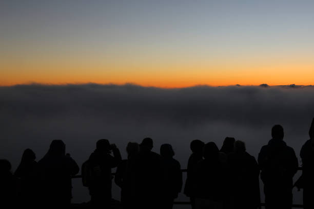 istock Tourists Waiting for Sunrise at Haleakala 1165649874