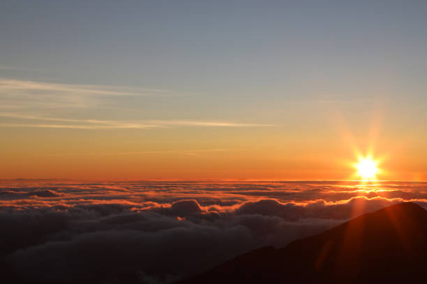 istock Sunrise above Clouds at Haleakala summit 1165651061