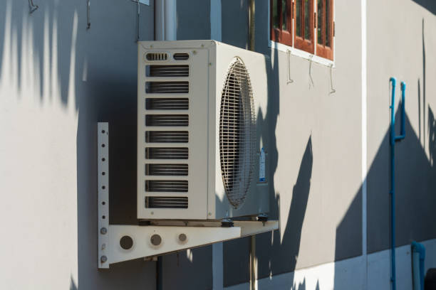 istock Air Compressors Installed on the side of the house. 1165653611
