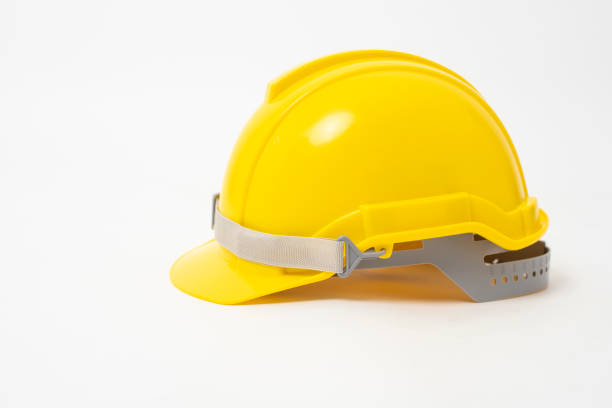 Yellow safety helmet on white background