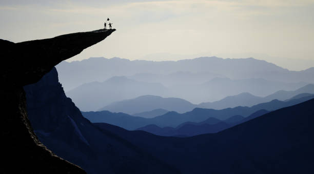 istock mystical peaks, determined and determined team success 1165661572