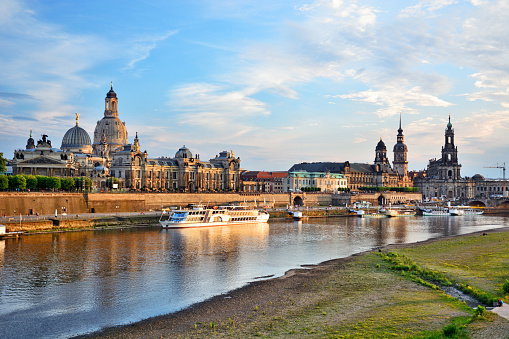 Dresden skyline with Frauenkirche and Elbe river at sunset, Germany