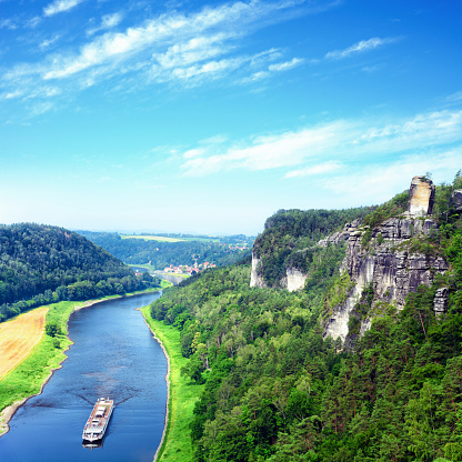 Panoramic view of the Elbsandstein Mountains and Elbe river in Saxon Switzerland, Germany. Composite photo