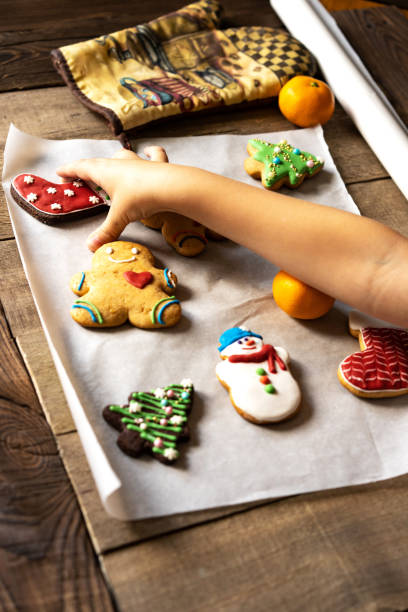 istock Christmas gingerbread cookies on a wooden rustic background 1165675520
