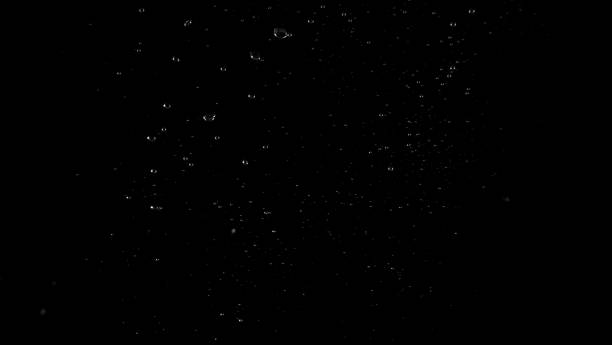 istock Water bubbles floating after splash underwater and black background which represent freshness of carbonate drink such as cola or soda and refreshing feeling of food product and texture. 1165681288