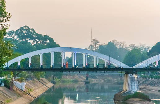 Lampang, Thailand, 22 July 2019, the bridge over Nam Wang The official name is Ratsadaphisek Bridge, the river branch of the Chao Phraya River. Important concrete bridge of Lampang, northern Thailand