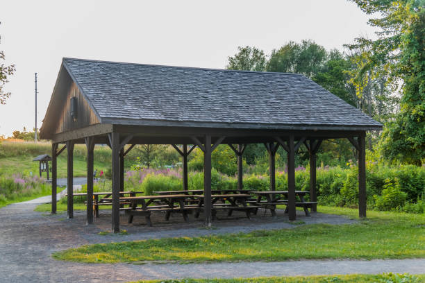 istock Sitting area between green fields in outdoor park in Nippon, Ottawa, Canada 1165684967