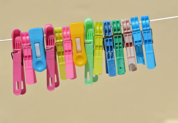 istock Background of colored clothespins on wire 1165685547