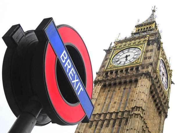 London Big Ben Brexit London, England, October 31 2019, Big Ben with photoshopped underground sign announcing the exit of England from the EU European Union brexit stock pictures, royalty-free photos & images