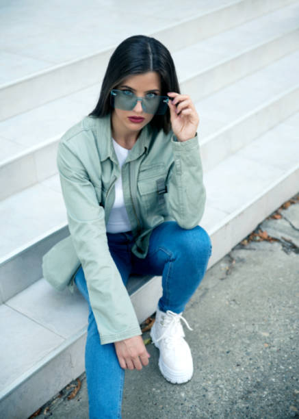 istock Young woman in jacket outdoors 1165691320