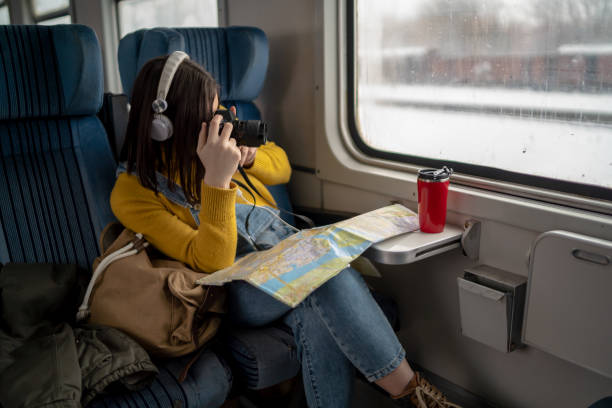 istock Young woman traveling by train 1165691987