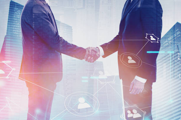 istock Handshake in city, social media 1165698118