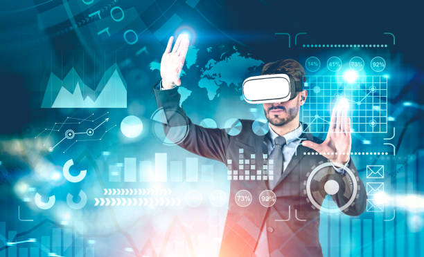 istock VR glasses man working with global infographics 1165699446