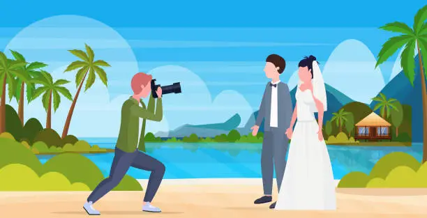 Vector illustration of professional wedding photographer shooting on camera newly weds couple bride and groom embracing tropical island summer sea beach seaside landscape background full length flat horizontal