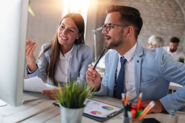 istock Image of two colleagues in modern office 1165700689