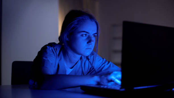 istock Overworked intern working on project during night shifts in hospital, education 1165702340