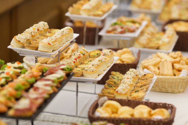 istock Shallow depth of field image with appetizers on a table at an event, provided by a catering company 1165702652