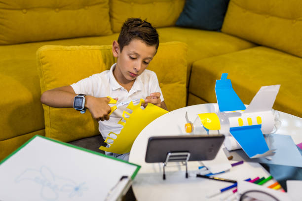 istock Learning from the internet how to recycle paper and plastic 1165702865