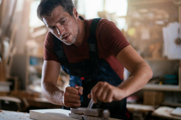istock Carpenter at work stock photo 1165703152